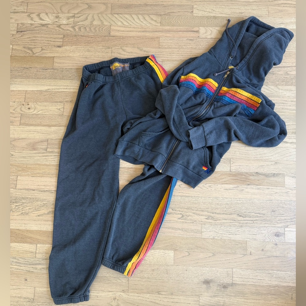 Aviator Nation blue Hoodie and Sweatpants Set with Rainbow Stripes.